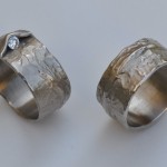 T6 - Speciale trouwringen met verborgen diamant uitgevoerd in een koelere witgouden kleur Palladium